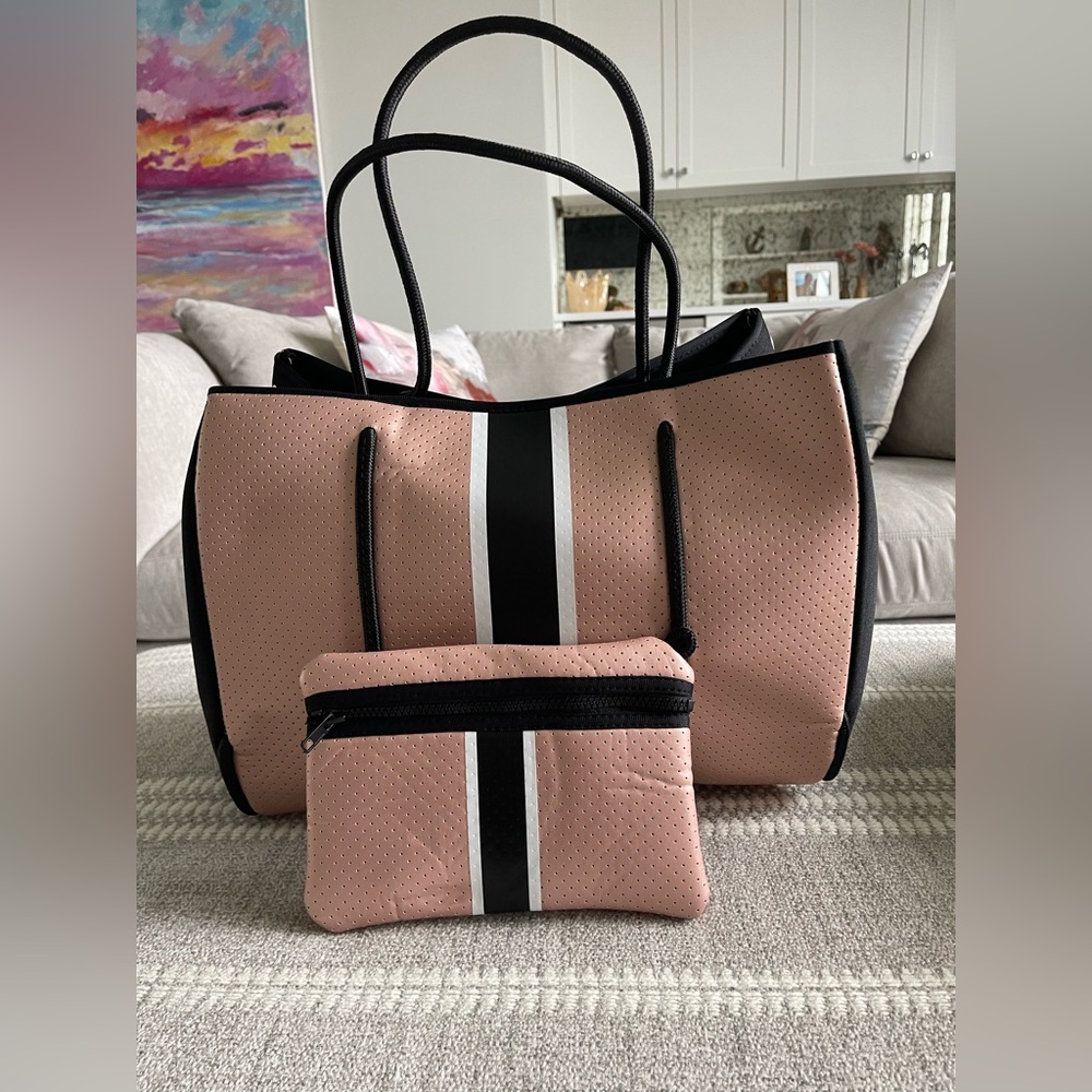 Haute Shore Greyson neoprene tote with matching wristlet.